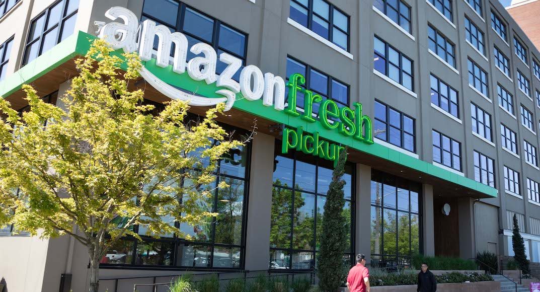 Seattle, Washington/ USA - May 2, 2018: Wide angle view of Amazon Fresh Pick Up, an online order and in store pickup service for Prime Members, at Starbucks downtown headquarters
